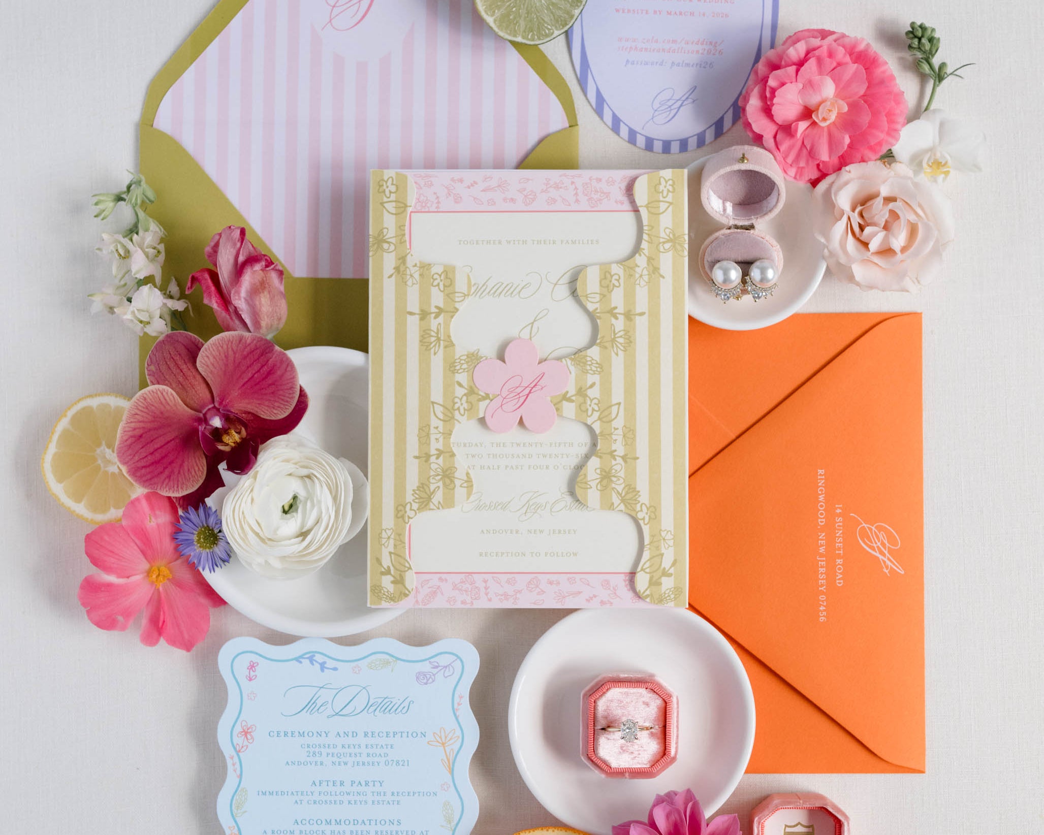 Colorful wedding invitation suite with decorative florals as accents.
