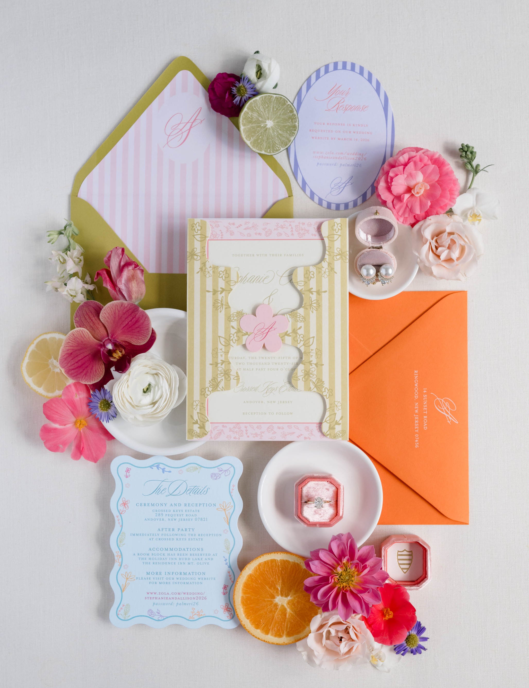 Colorful wedding invitation suite with decorative florals as accents.