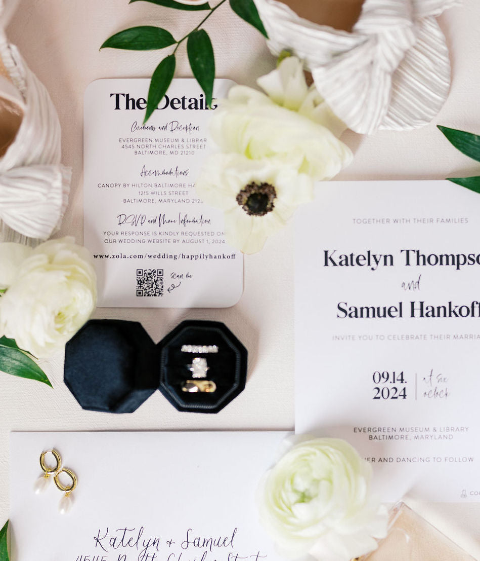 Black and white invitation suite.  The bottom on the card features a black QR code with "Scan Me" printed next to it.