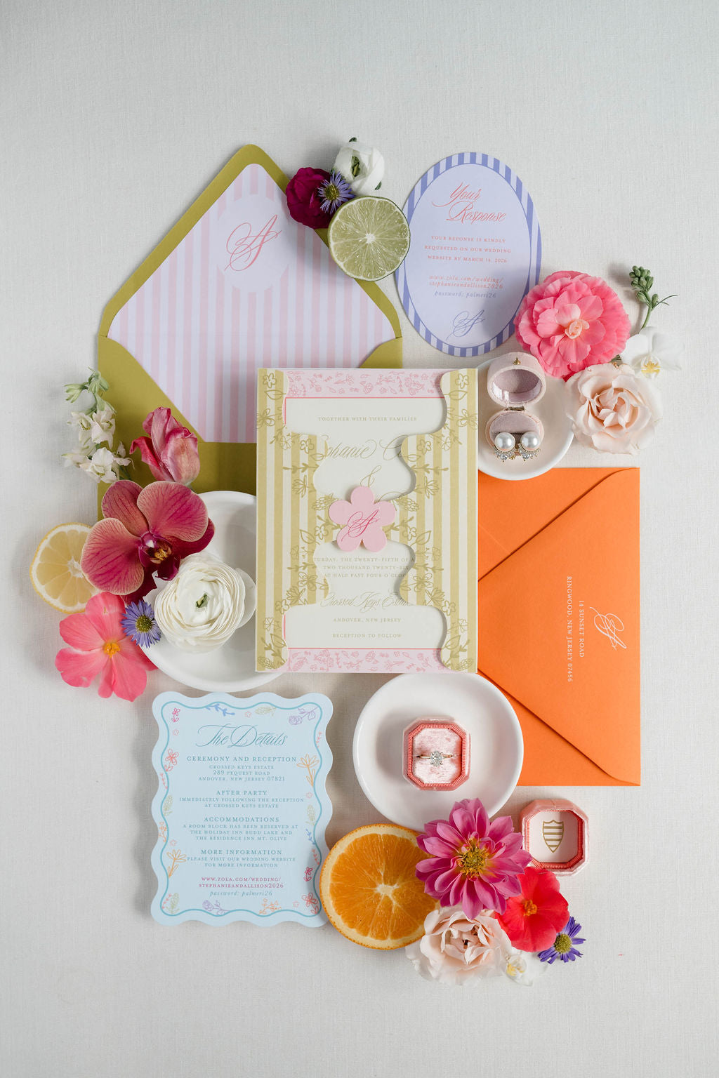 Colorful stationery set with flowers and citrus on a light gray background